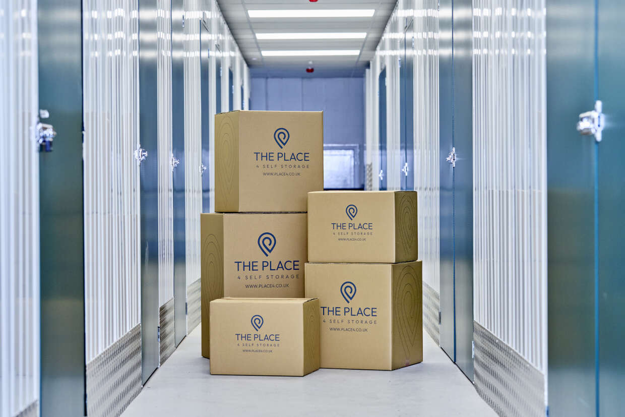 the-place-4-self-storage-branded-boxes-in-corridor-with-secure-storage-units-1240x827